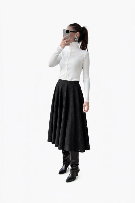 Haut écru côtelé à col montant pressionné