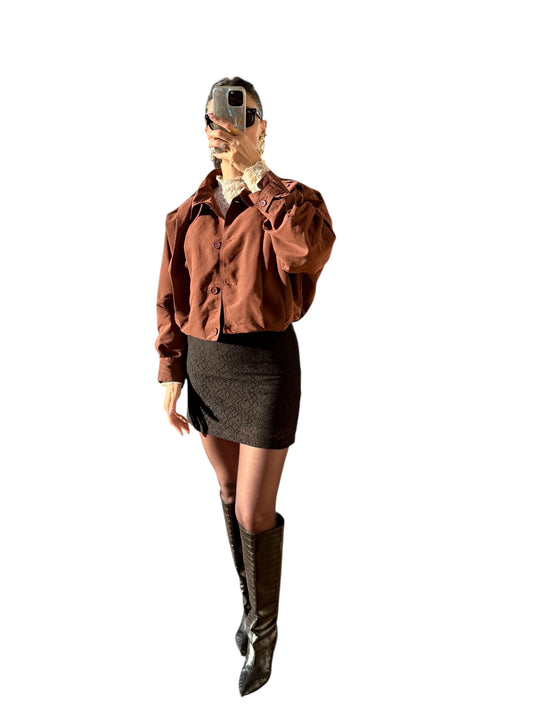 Veste drapée à épaullettes