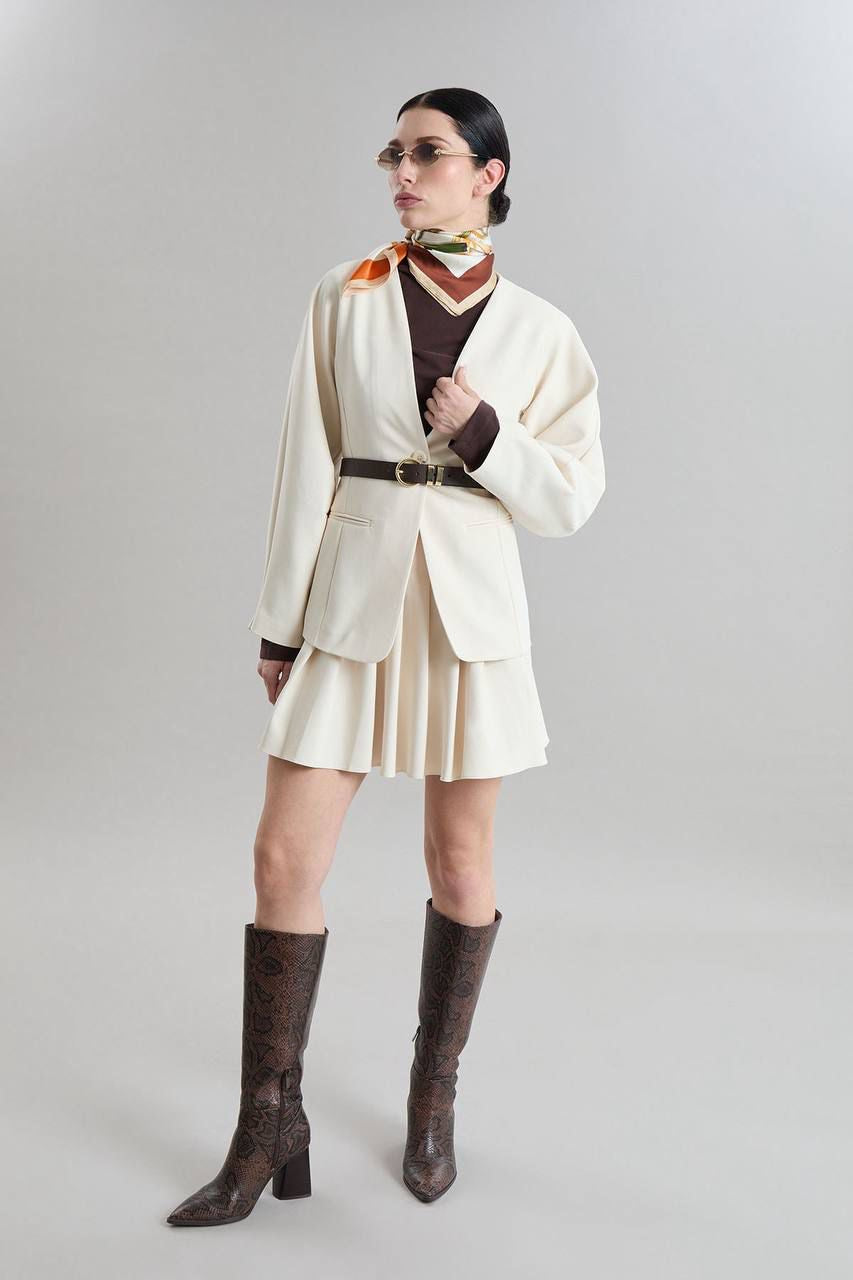 ensemble veste jupe écru manches ballons