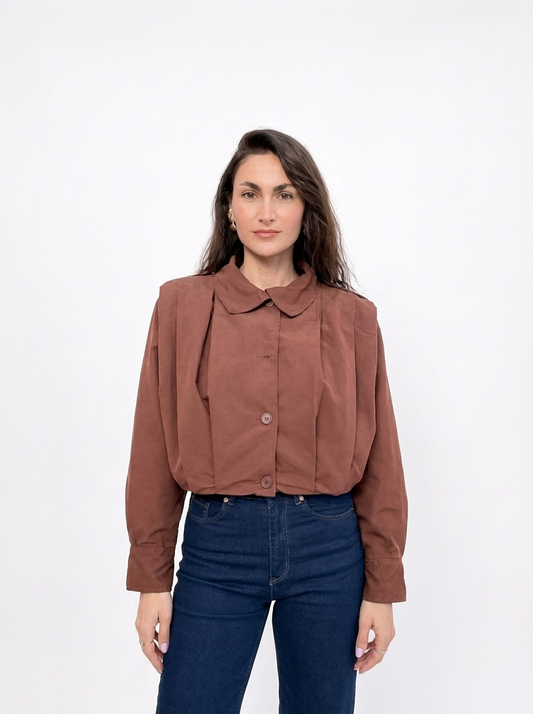 Veste drapée à épaullettes