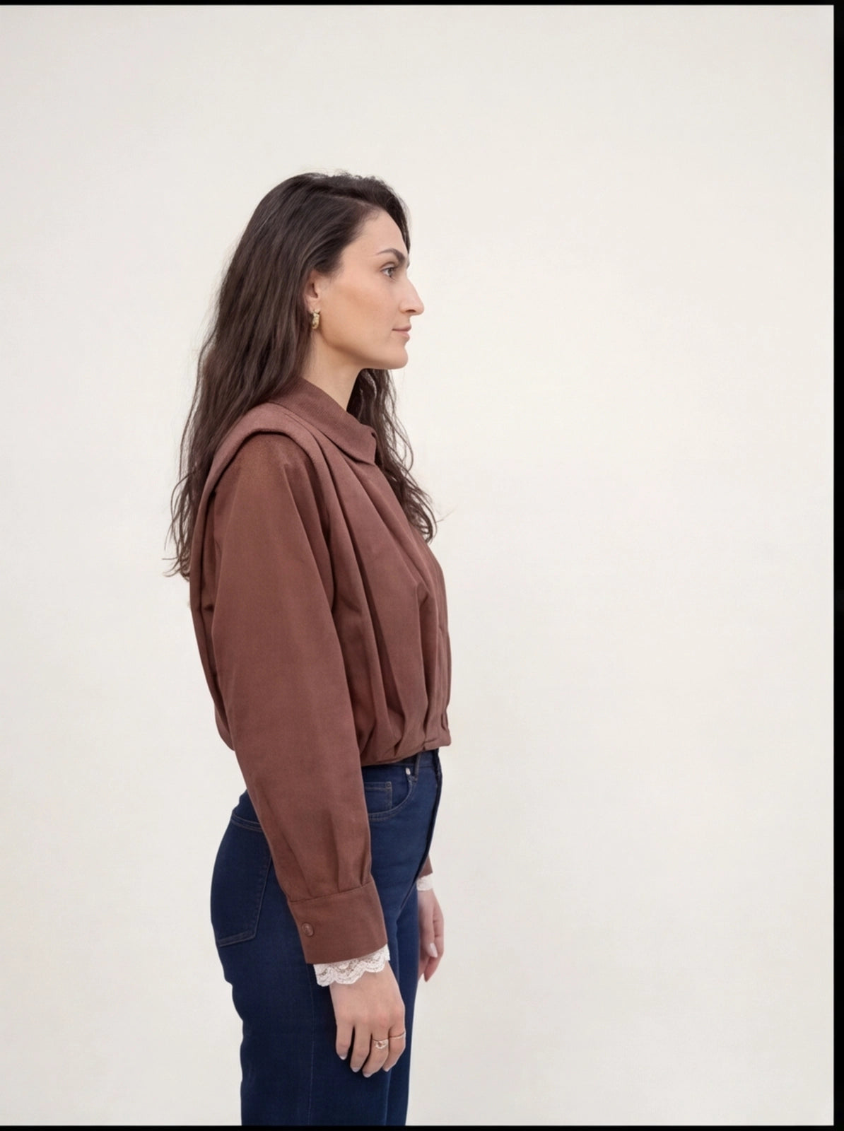 Veste drapée à épaullettes